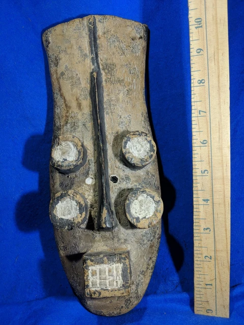 Worn Grebo Mask with Four Eyes and Pigments — Authentic Carved African Wood Art