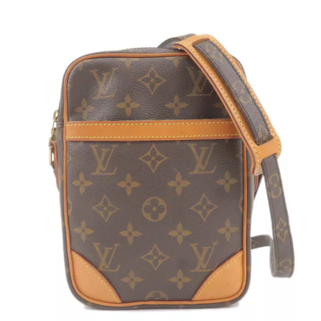 LOUIS VUITTON. Shoulder bag in navy leather and monogram…