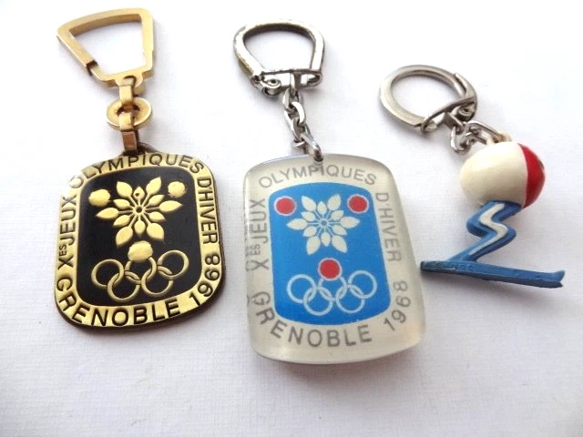 UNE PAIRE DE 2024 Paris Jeux olympiques mascotte porte - clés frigi EUR