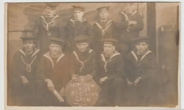 WW1 Era New Year's Group Portrait Of Sailors in P.I. 6" Guns Crew RP PPC, Unused