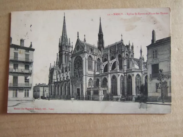 Cpa Nancy (54) Eglise Saint Epvre Et Place Des Dames. Maison Des Magasins Reunis