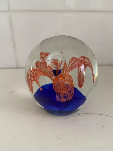 Vintage Art Glass Paperweight Orange Flower with blue