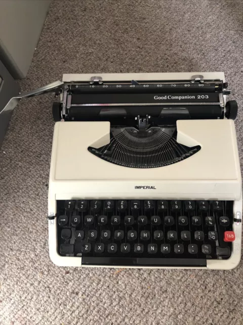 Imperial Good Companion 203 manual portable typewriter with plastic case. Used