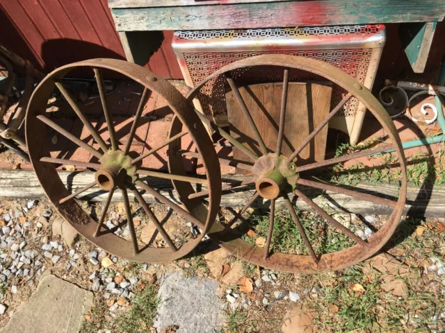 Pair  Cast Iron Wagon/ Cart Wheel 25” Diameter x 3in thick 12 Spokes