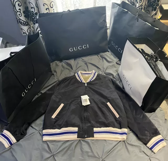 Black and gold gucci jacket top