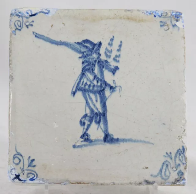 antique 17th C. Delft blue Tile, marching Soldier with musket and sword, ca.1650
