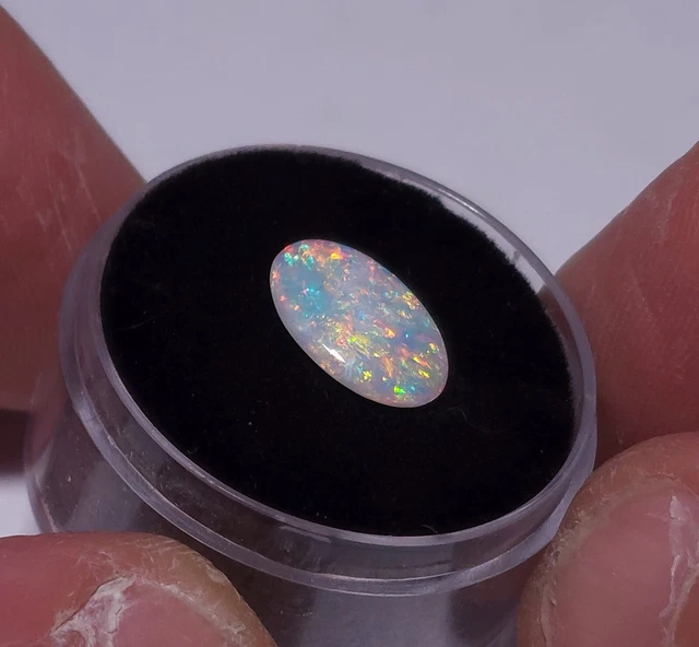 Australian Coober Pedy opal, 12 x 8mm Oval.   1.1ct. Natural solid opal