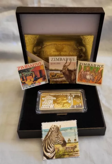 Simbabwe Silber Goldbarren COA Box altes Zebra Nashorn Briefmarken Etui Afrika Hütte HIV Aids