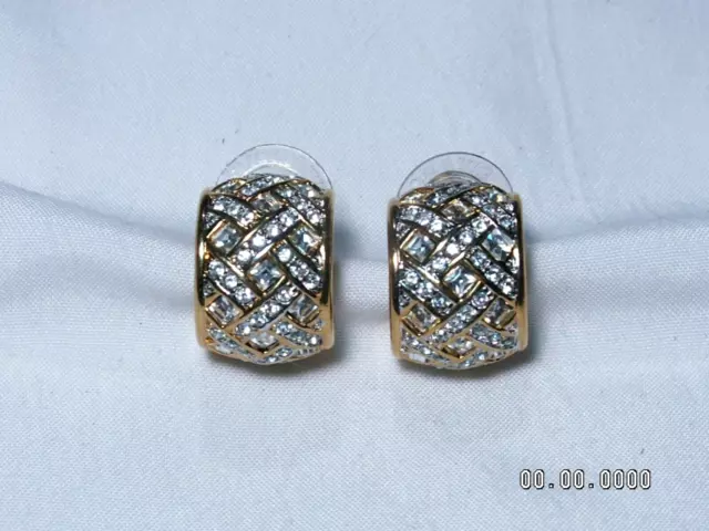 ...Swan signed SWAROVSKI...Gold Tone, Crystals Wide Curved Pierced Earrings...