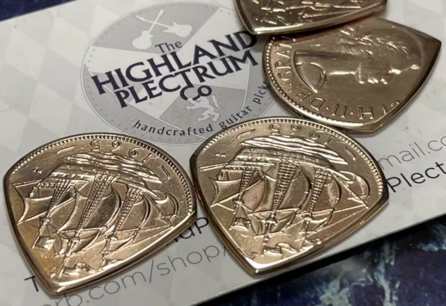 The Highland Plectrum Co. One Elizabeth 1959 Half Penny Coin Guitar Plectrum.