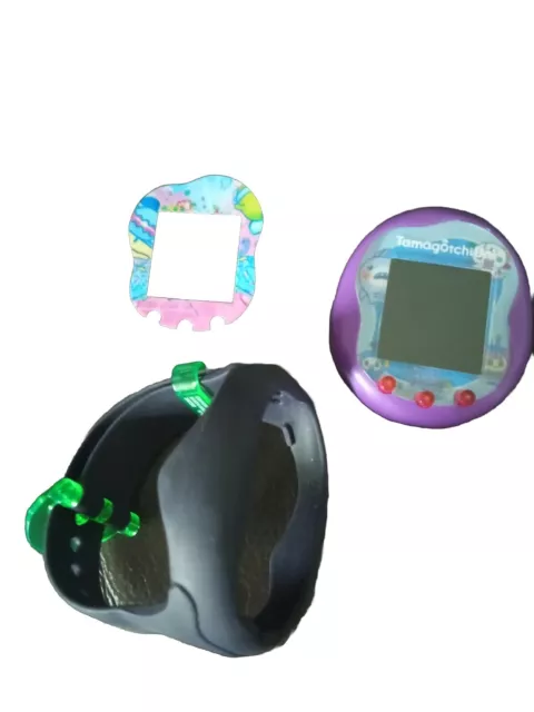 Tamagotchi Uni With Black Wristband and Glow In The Dark Custom Faceplates