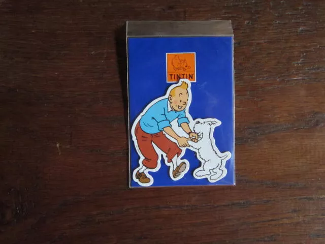 Hergé, Tintin et Milou devant le mur, Pixi, 1995