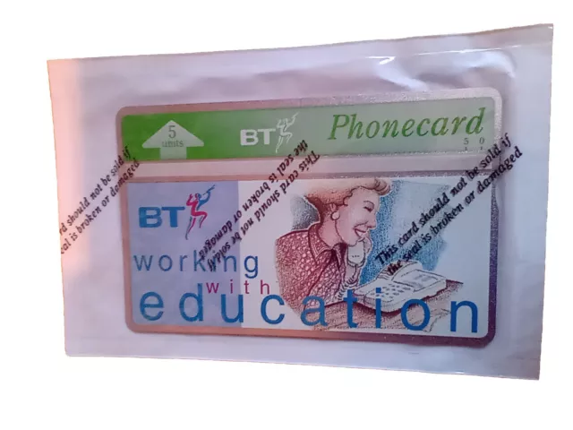 BT Mint Phonecard. 5 units. BT Working With Education. Lady On The Telephone.