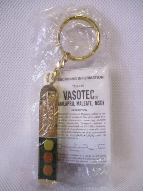 Vasotec Gold Key Chain Medication Resin Pharmaceutical Drug Rep Promo Advert NOS