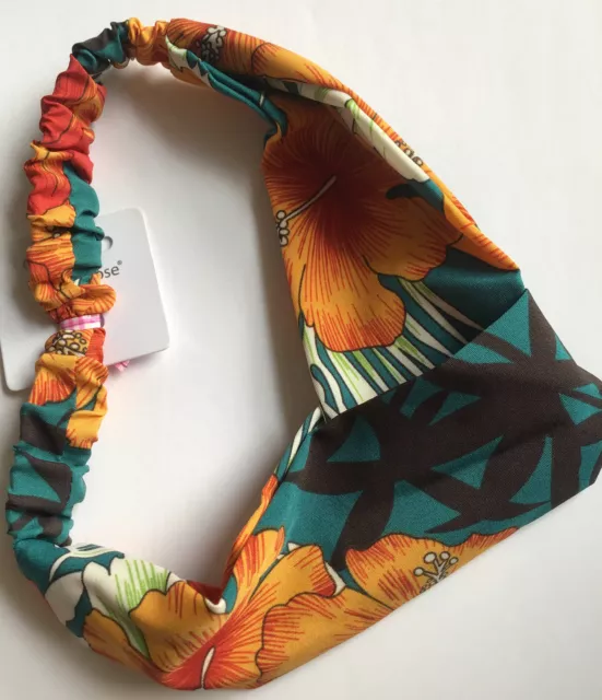 A Dark Turquoise And Orange Tropical Print Silky Scarf Style Head Band