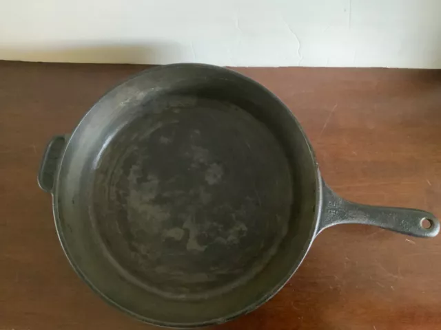 https://www.picclickimg.com/UbEAAOSwsvNlXm8f/Vintage-American-Cookware-Cast-Iron-12-Skillet-Pan.webp