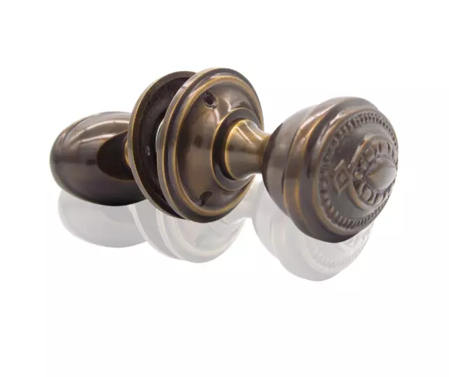 brass oval sprung door knobs heavy and solid, polished lacquered, nickel set