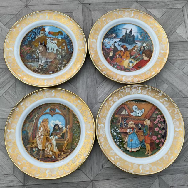 4 decorative porcelain collectible plates showing grimms fairy tales