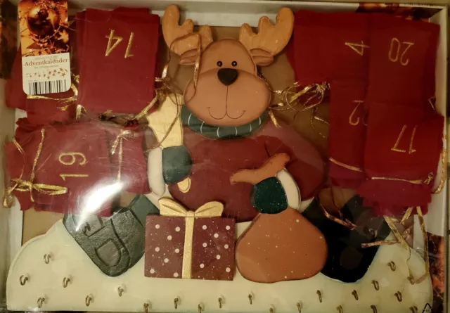 Adventskalender zum Befüllen aus Holz mit 24 Filzsäckchen