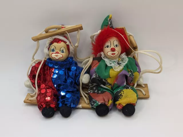 Vintage Porcelain Clown Dolls on Swings