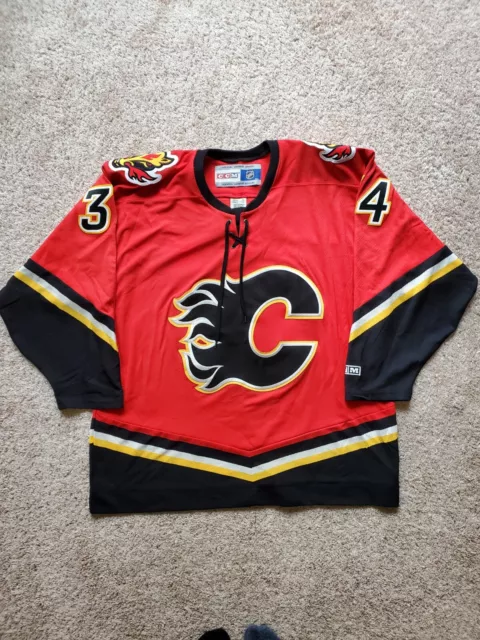 Calgary Flames Blank CCM Pedestal Sz. 52 Authentic Hockey Jersey Center Ice  - Đức An Phát