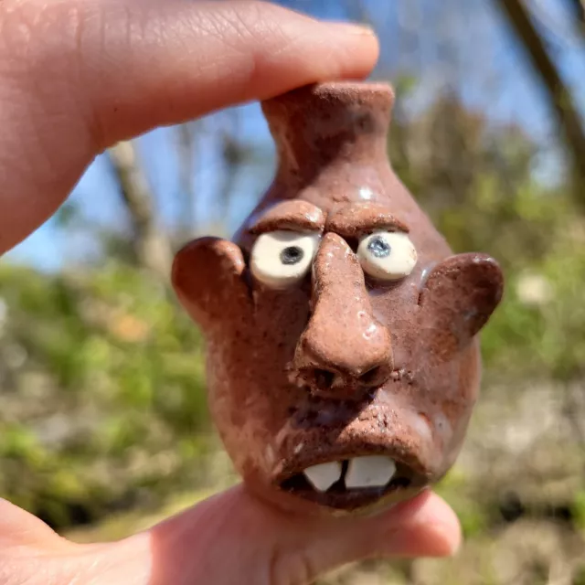 2.25" Mini Brown Face Jug with Textured Glaze by Wayne Hewell 2.25" Mini Brown Face Jug with Textured Glaze by Wayne Hewell