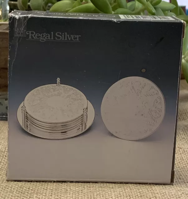 Set of (4) Vintage Regal Silver Plated Embossed Coasters with Stand NIB 3.5”