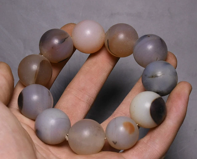 Bracelet d'élasticité de bijoux de perles sculptées en agate naturelle ancienne
