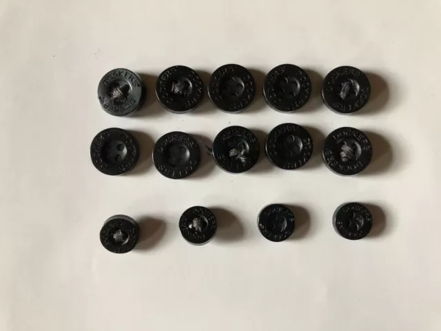 Botones Dockers de color negro (10 grandes y 4 pequeños)