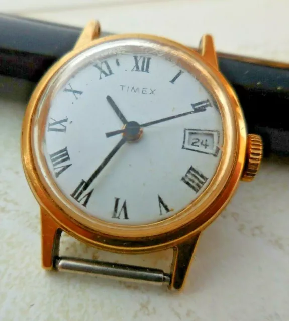 ANCIEN MONTRE MÉCANIQUE TIMEX A DATE,FONCTIONNELLE ET PRÉCISE bon état d'usage