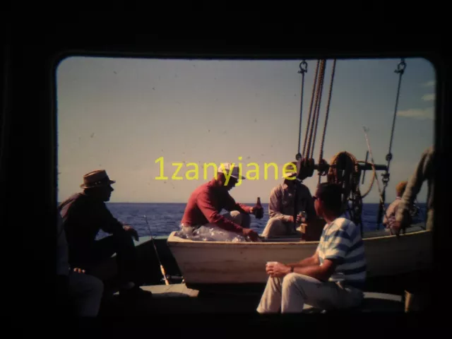 3T07 VINTAGE Photo 35mm Slide MEN ON FISHING BOATS ON WATER HATS BEERS IN HAND