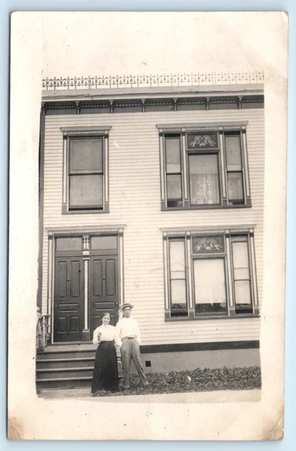 POSTCARD RPPC Hesperia Michigan Couple in Front of House Stained Glass Windows