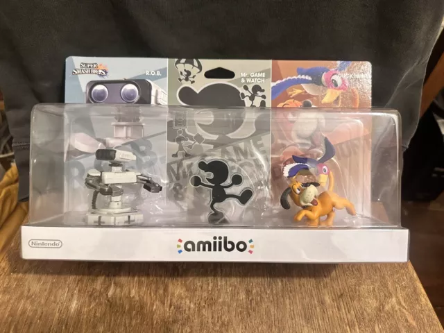 Day 18 of getting every Smash amiibo: R.O.B., Mr. Game & Watch, and Duck  Hunt! Been meaning to get this three pack for a while and when I saw a  listing of