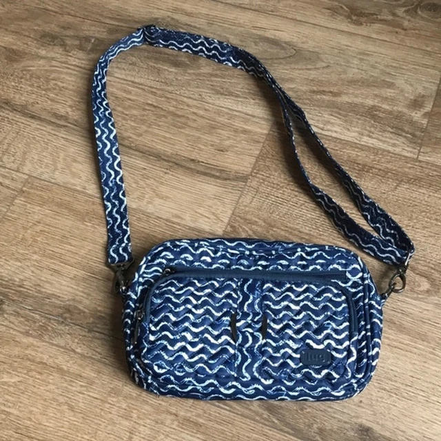 Lug Carousel Convertible Mini Crossbody and Belt Bag. Navy. Quilted