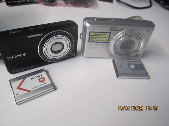 2 Sony digital cameras with batteries