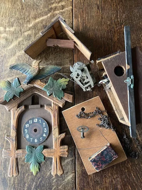 Vintage cuckoo clock parts. Origin  unknown.