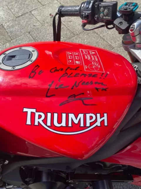 Liam Neeson and Ciaran Hinds Autographed with message Motorcycle Fuel Tank.
