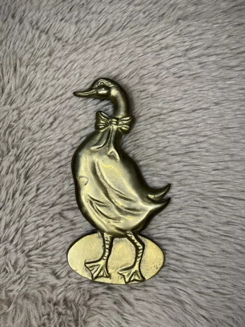 "Llamador de puerta ganso amigable con el latón 1987" de colección