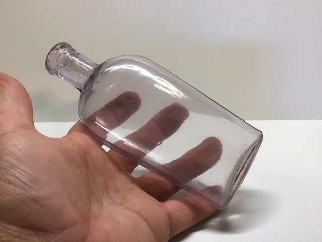 Antique Light Amethyst 1/2 Pint Strap Side Whiskey Flask.