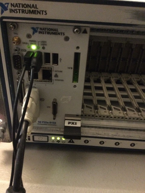 National Instruments PXIe-1085 PXI Chassis 18-Slot w/ PXIe-8133 PXI Controller National Instruments PXIe-1085 PXI Chassis 18-Slot w/ PXIe-8133 PXI Controller