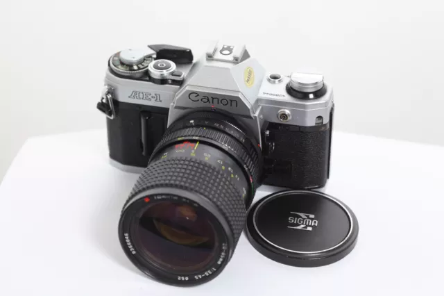 Canon Ae-1 + Objetivo 28-85Mm F/3,5-4,5 Fd  Tokina , Cámara Slr Reflex
