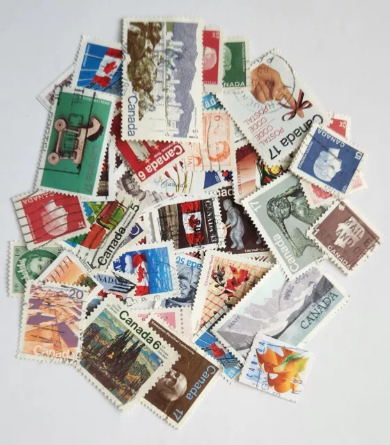 Canada Stamp accumulation, kiloware , 2 oz around 550 off paper stamps .