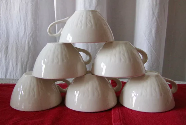 § Ensemble de 10 tasses anciennes en faïence blanche