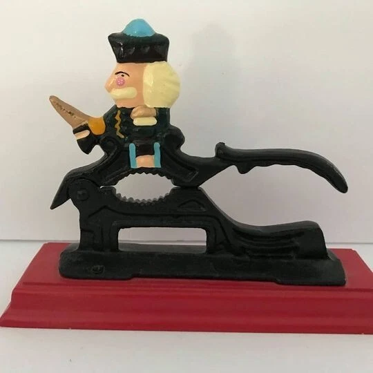 Nut Cracker Soldier Vintage Cast Iron Metal Nutcracker on Red Wood Base