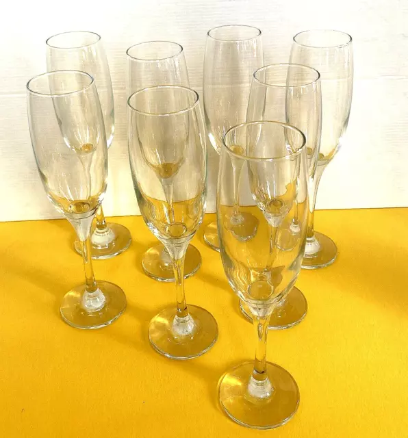 Champagne / Prosecco Glasses x8. Traditional tall narrow flutes. Stemmed. Clear.