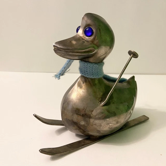 Vintage Viking Plate EP Brass Skiing Duck Coin Bank 5 Inch Tall Missing Stopper