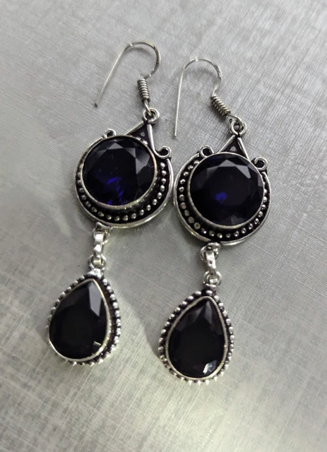 Silver Dangling Earrings With Blue Stones