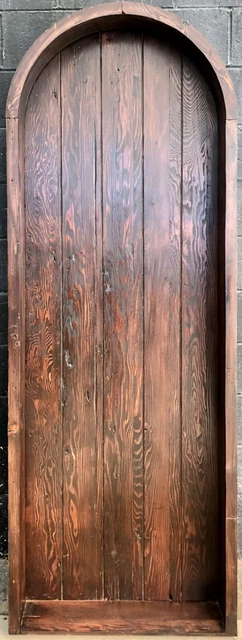 Rustic reclaimed lumber arched door solid wood storybook castle winery plank