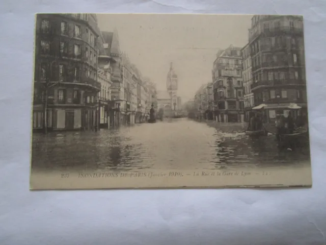 cpa paris inondations janvier 1910 la rue et la gare de lyon