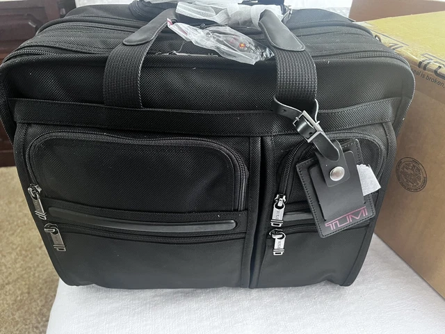 TUMI Alpha Deluxe Expandable Wheeled Rolling Briefcase Bag.   Ballistic Nylon. 7